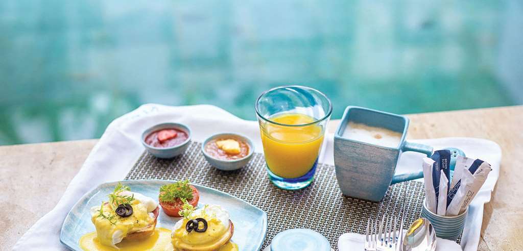 Azana Boutique Hotel Denpasar Ресторан фото